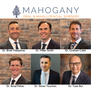 A photo of the implant dentist that are at Mahogany Oral Surgery. They place dental implants so that dental crowns can replace missing teeth.